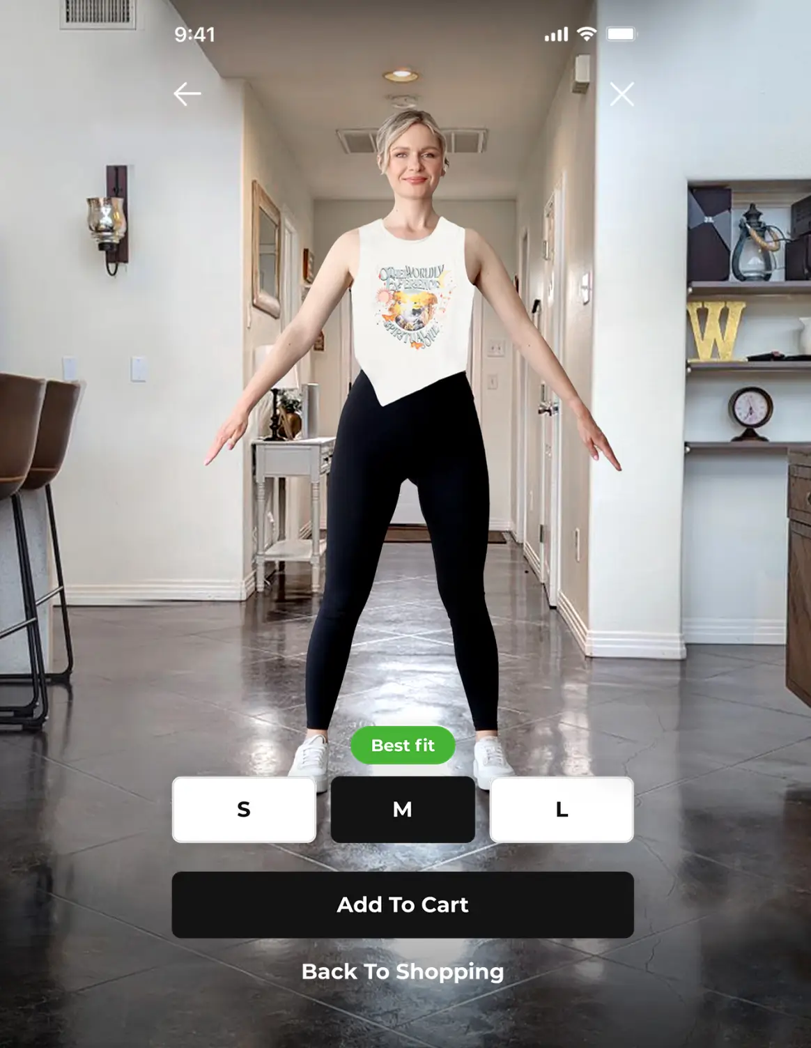 A woman stands in a hallway modeling a white sleeveless top and black leggings. The screen displays size options with buttons labeled S, M, and L, with "Best fit" indicated for size M. A popup provides SEO keywords for better reach and img centers on her as she showcases the outfit.