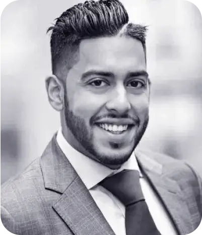 A black and white photo of a man in a suit, captured using AI technology.