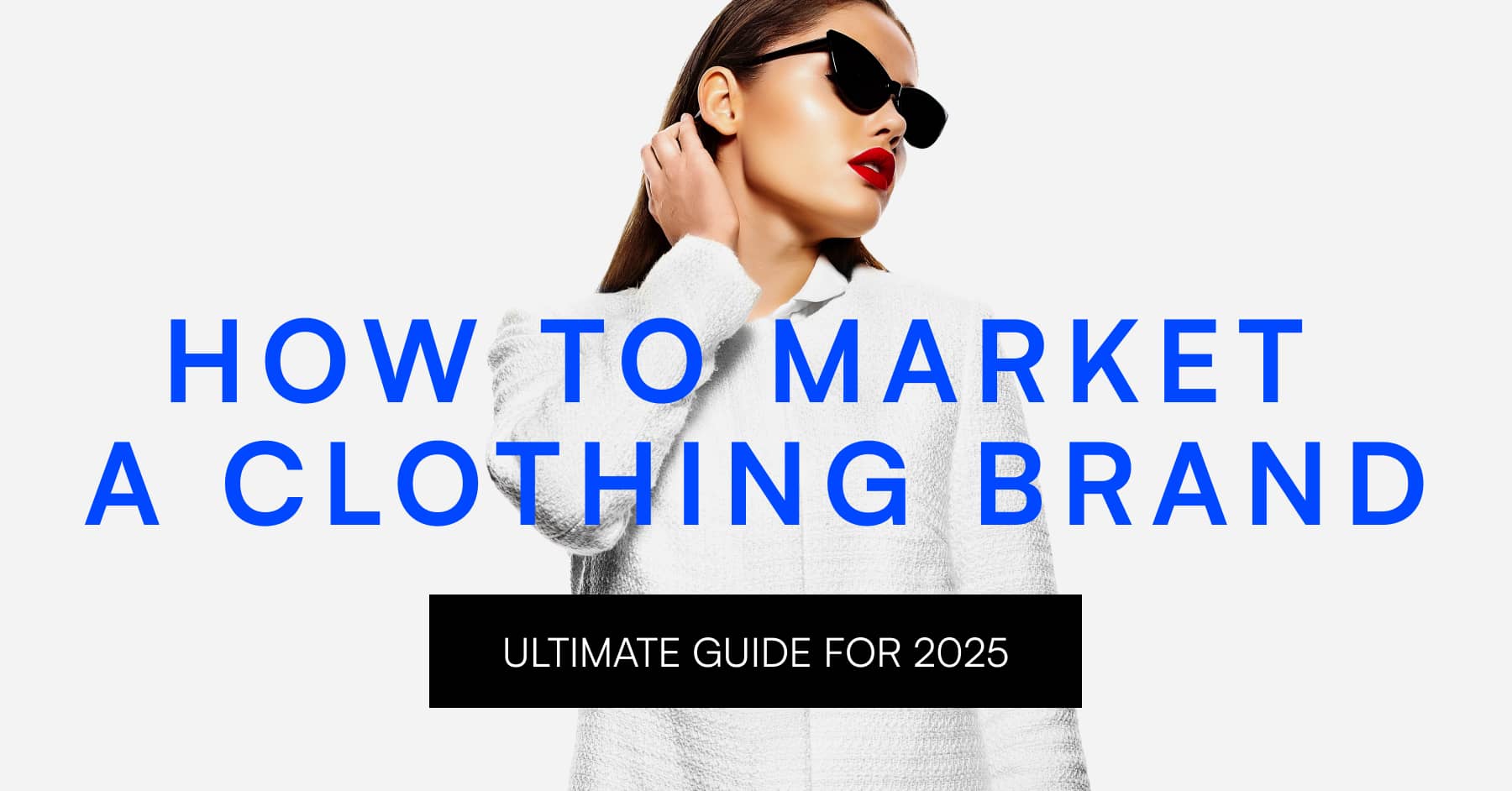 A person in a white coat and sunglasses stands against a white background, showcasing "Ultimate Guide: How to Market a Clothing Brand for 2025.