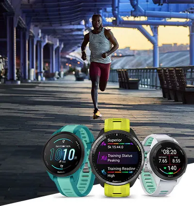 A person runs under a bridge at dusk. In front, there are three colorful smartwatches displaying various fitness statistics, showcasing the latest trends in the connected fitness industry for 2024.