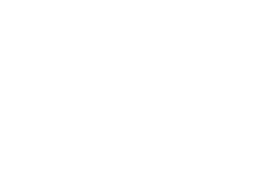 The image displays the Zing Coach logo, prominently featured on the homepage, with a stylized arrow-like design to the left of the text "Zing Coach" in white.